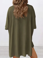 Olive green oversized t-shirt dress with round neck and side slits