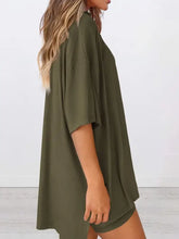 Olive green oversized t-shirt dress with round neck and batwing sleeves