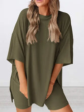 Olive green oversized t-shirt dress with round neck and side pockets