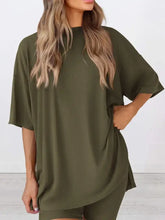 Olive green oversized t-shirt dress with round neck and side pockets