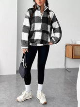 Full size plaid sherpa sweatshirt in black and white checkered fleece with half-zip front and machine wash care instructions