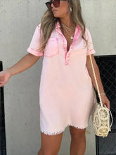 Pink denim dress in full size with raw hem, frayed collar details, and slightly stretchy short sleeve design