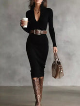 Black ribbed knit midi dress with deep V-neck, long sleeves, brown belt