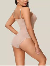 Beige sheer full size scoop neck shaping bodysuit plus size with thin spaghetti straps and form fitting silhouette