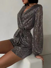 Shimmering silver sequin surplice tie waist long sleeve romper, machine wash