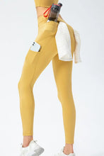 Full Size Slim Fit High Waist Long Sports Pants with Pockets Gold Woman Leggings