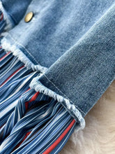 Blue denim jacket with frayed edges and gold button layered over full size striped patchwork denim skirt plus size