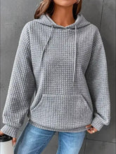 Full size plus size gray waffle-knit hoodie with textured kangaroo pocket and drawstrings in front