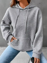 Gray waffle-knit plus size hoodie with drawstrings and textured kangaroo front pocket for casual wear