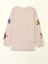 Full size turkey graphic corded baggy sweatshirt plus size in soft pink with colorful embroidered turkey sleeves, machine wash cold