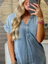 Light blue denim dress with v-neckline and ruffled short sleeve denim top in plus size full size design