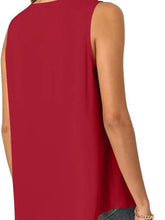 Plus size sleeveless tank top in red with a flowing lightweight fabric and relaxed fit with a v neck design