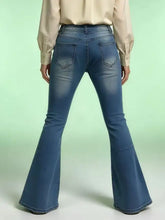 Full size vintage wash blue denim flare jeans with high-waisted design and subtle fading for a worn-in look