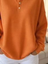 Full size waffle knit button detail sweatshirt plus size in cozy orange with cream buttons and machine wash fabric
