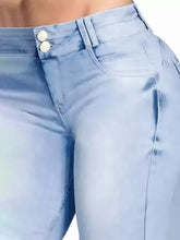 Light-wash size wash high-waisted flare jeans with white buttons and slim fit for plus size wear