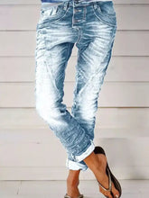 Full size washed button-fly jeans in light-wash denim with a distressed faded look for plus size wear