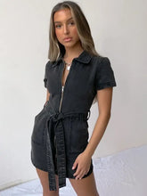 Full size zip front short sleeve black denim dress with collar tied waist belt and front zipper closure in denim material