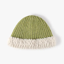 Fuzzy hem knit hat with green ribbed knit and faux rabbit fur brim