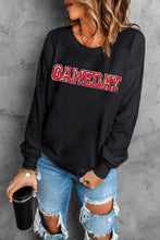 Game Day Round Neck Long Sleeve Sweatshirt in black with red lettering, jeans, mug