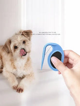 Gentle knot remover pet hair comb with blue plastic grip and fine metal teeth
