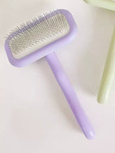 Spazzola delicata per rimuovere i peli degli animali con manico lavanda e setole sottili in filo metallico
