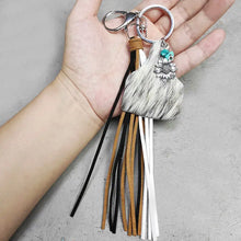Genuine leather key chain with sunflower charm and turquoise fringe