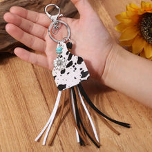Genuine leather key chain with turquoise fringe and sunflower charm