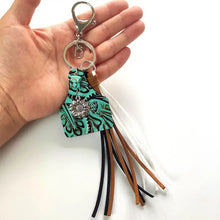 Genuine leather key chain with turquoise fringe and sunflower charm