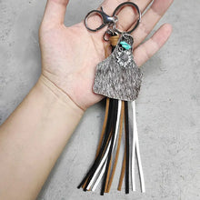 Genuine leather key chain with turquoise fringe and sunflower charm
