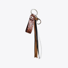 Genuine leather tassel keychain with embossed floral strap and multi-color accents