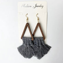 Geometric earrings with wooden triangle frames and gray macrame tassels