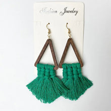 Geometric earrings with wooden triangle frames and green tassels