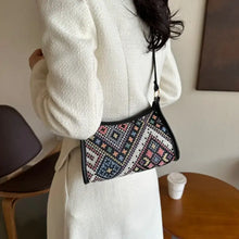 White tweed jacket with printed crossbody bag