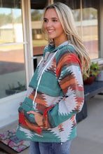 Teal Aztec print womens hoodie with long sleeves, half-zip, and drawstrings
