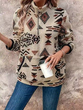 Beige fleece geometric half zip long sleeve sweatshirt with black brown rust tribal pattern machine wash cold
