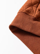 Caramel-colored geometric quilted half zipped loose sweatshirt sleeve with ribbed knit cuffs machine wash care instructions