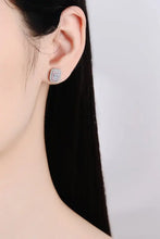 Womans ear with geometric stud earring in sterling silver