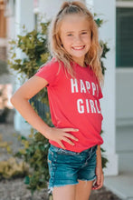 Young girl in girls letter graphic short sleeve red t-shirt and denim shorts