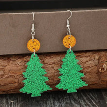 Green glitter acrylic tree shape earrings with orange tops