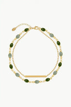 Gold alloy double-layered anklet with green and grey oval beads and bar charm