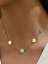 Gold hexagon necklace with opal center, mother-of-pearl inlay