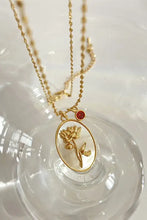 Gold copper necklace with flower shell pendant and turquoise charm