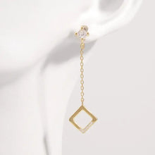 Gold dangle earrings with inlaid zircon and rhombus drop