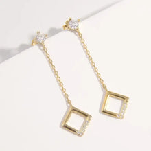 Gold dangle earrings with inlaid zircon and rhombus drop