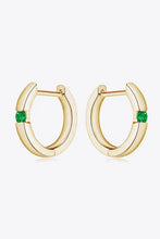 18k gold huggie hoop earrings with lab-grown emerald accents and matching box
