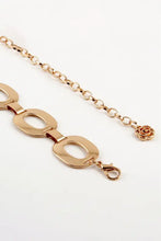 Bracelet ovale en or rose avec breloque florale et fermoir homard ceinture en ferroalliage