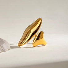 Gold-plated stainless steel abstract double leaf ring with glossy finish