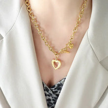 Gold-plated titanium steel heart pendant necklace with open heart