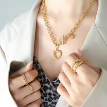Gold-plated titanium steel heart pendant necklace with toggle clasp and rings