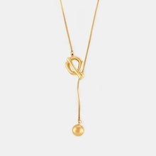 Gold-tone Y-shaped stainless steel bead necklace with toggle clasp and spherical pendant